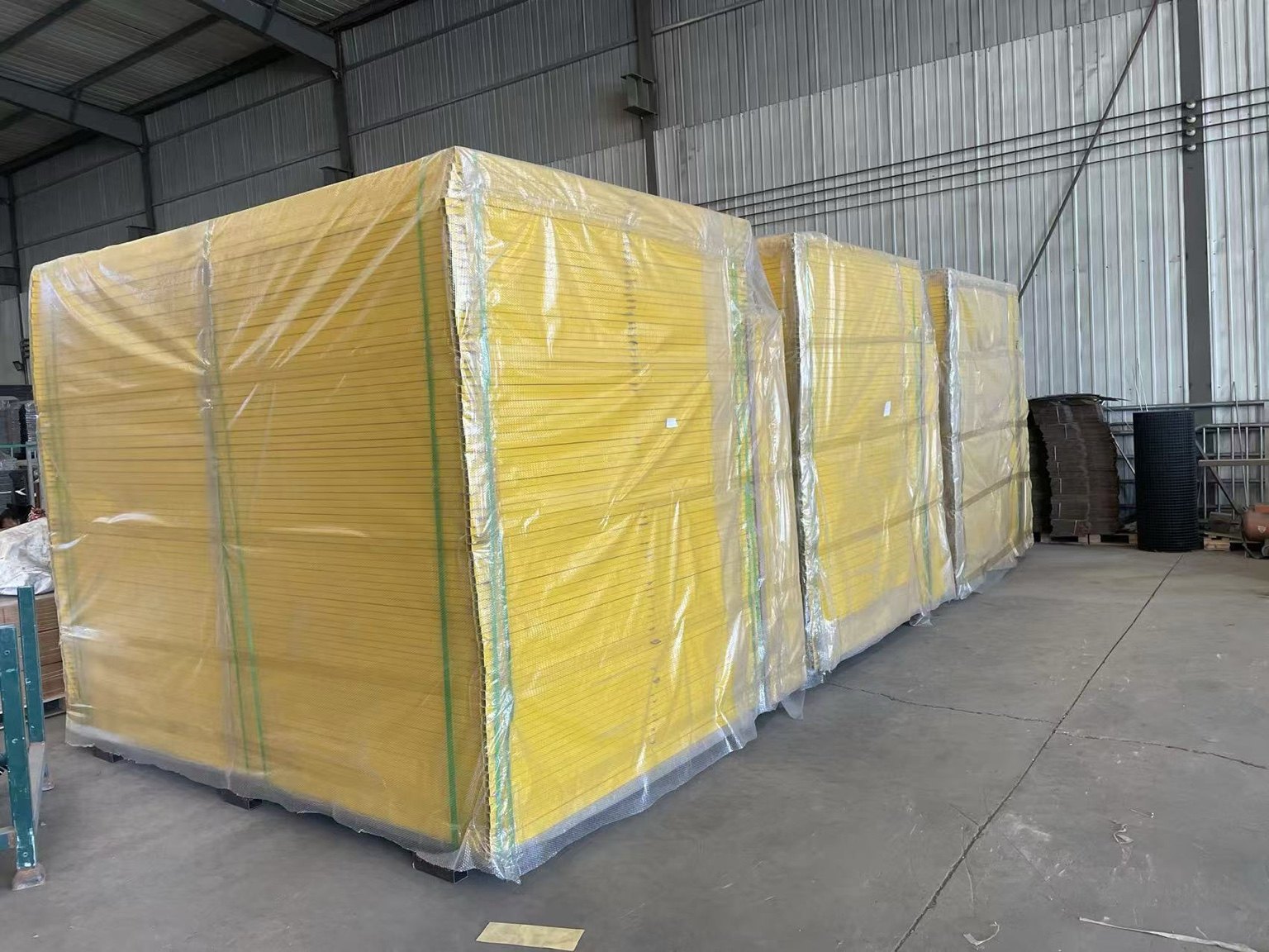 Wrapped yellow fencing inventory in warehouse